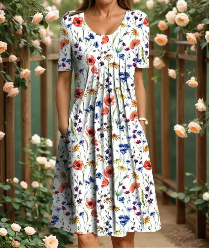 Agnes- Robe fleurie élégante avec une coupe conviviale pour le ventre