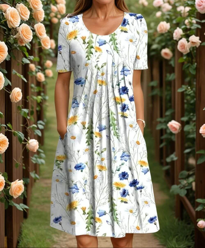 Agnes- Robe fleurie élégante avec une coupe conviviale pour le ventre