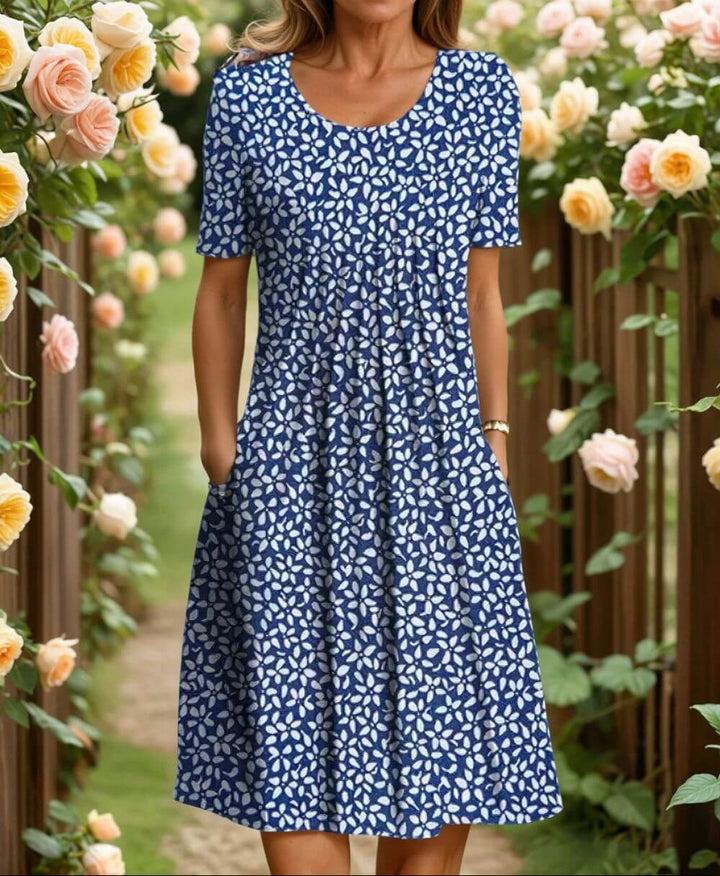 Agnes- Robe fleurie élégante avec une coupe conviviale pour le ventre