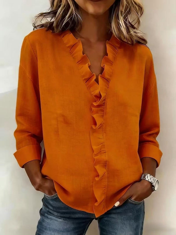 Chiara | Blouse à col en V avec des volants délicats