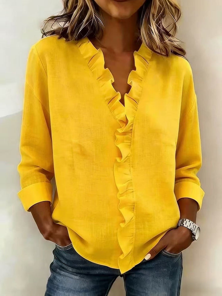 Chiara | Blouse à col en V avec des volants délicats