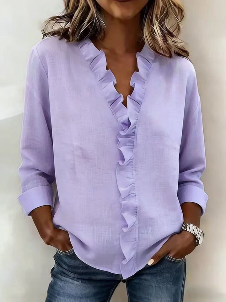 Chiara | Blouse à col en V avec des volants délicats
