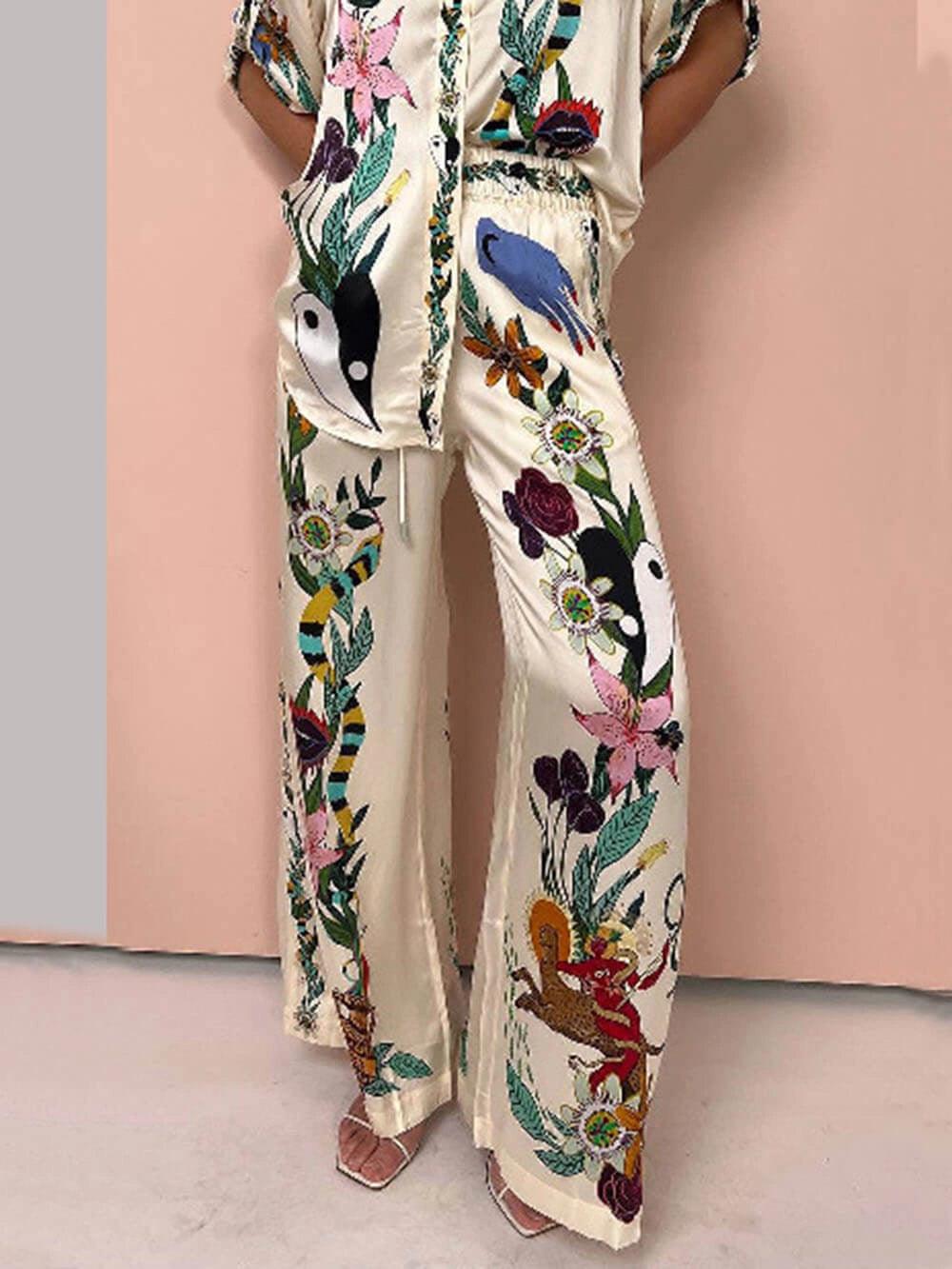 Nika | Ensemble chemise et pantalon en satin à imprimé unique Vibes Resort